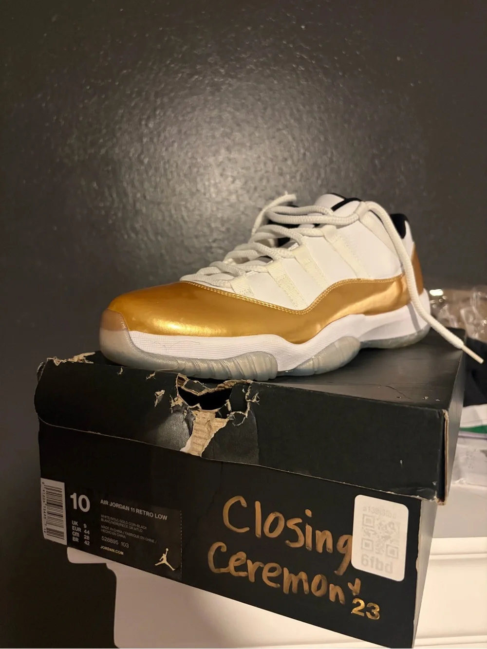 Jordan Men’s Low-Top Sneakers in White and Metallic Gold